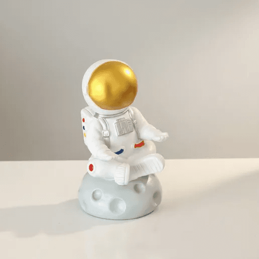 Support à lunettes et figurine de bureau astronaute en méditation