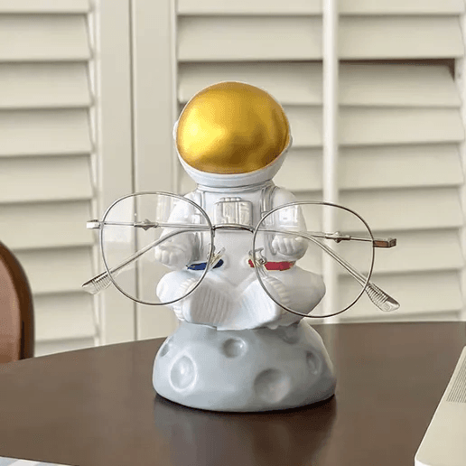 Support à lunettes et figurine de bureau astronaute en méditation