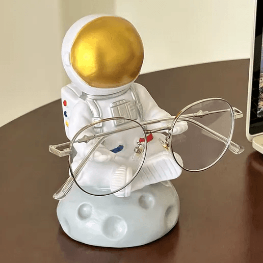 Support à lunettes et figurine de bureau astronaute en méditation